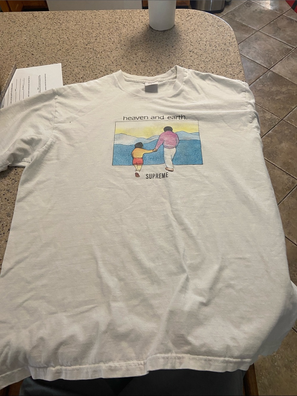 Supreme White Kids Graphic Tee with Colorful 'Heaven and Earth' Print